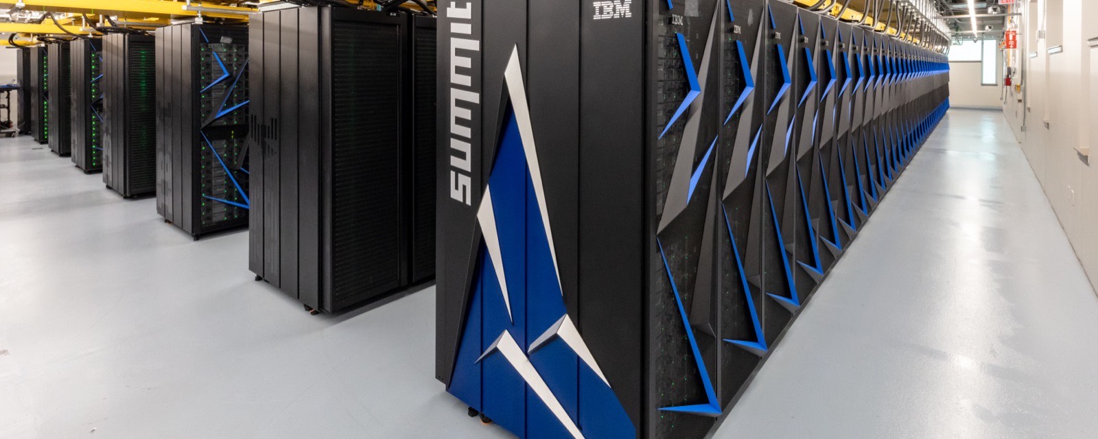 Rows of cabinets of the Summit supercomputer at Oak Ridge National Laboratory